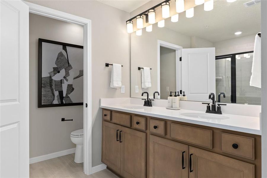 Furnished interior view inside a new home in Parkside Trails, Clermont (Image 23).