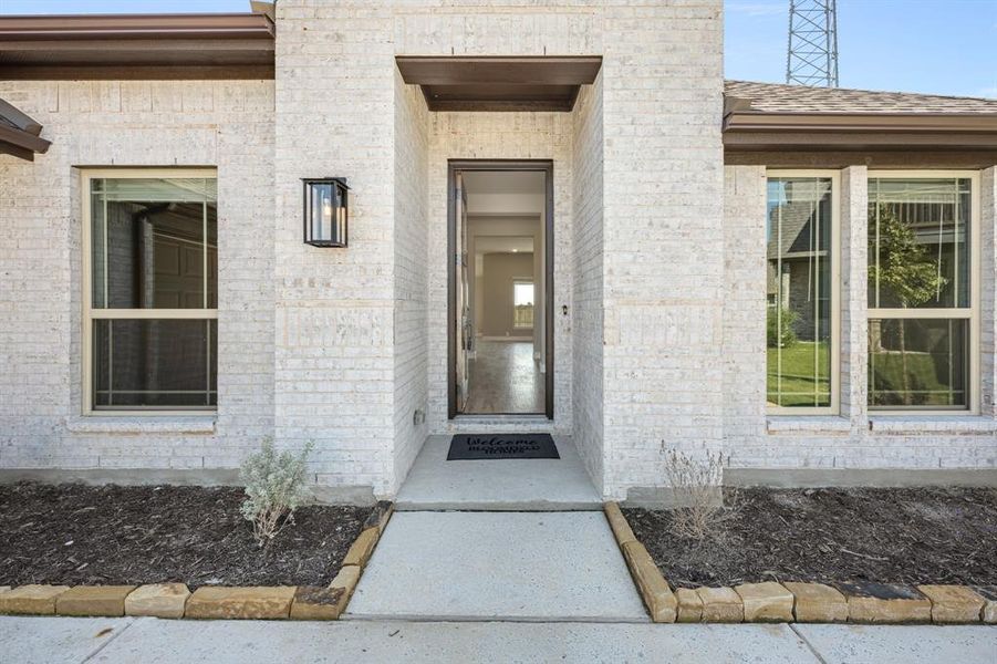 Exterior details and patio area of a home in East Oak Creek 50-55, Commerce (Image 3). Exterior details and patio area of a home in East Oak Creek 50-55, Commerce (Image 3).