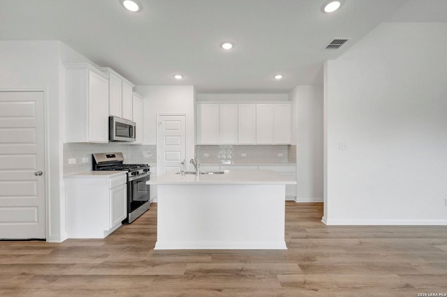 Furnished interior view inside a new home in Mesquite Ridge, San Antonio (Image 4).