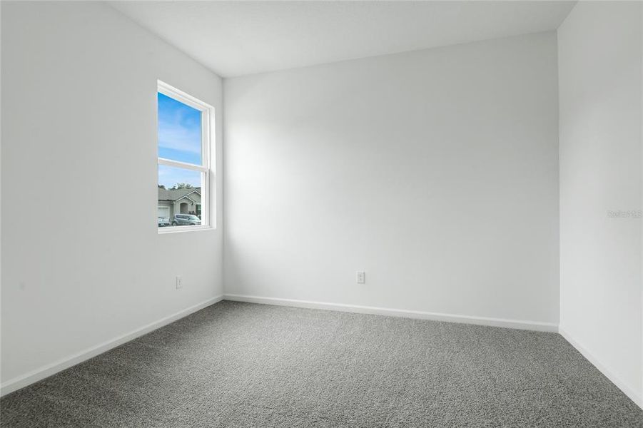 Spacious, unfurnished interior of a new home in Seasons at Grandview Gardens, Deland (Image 11).