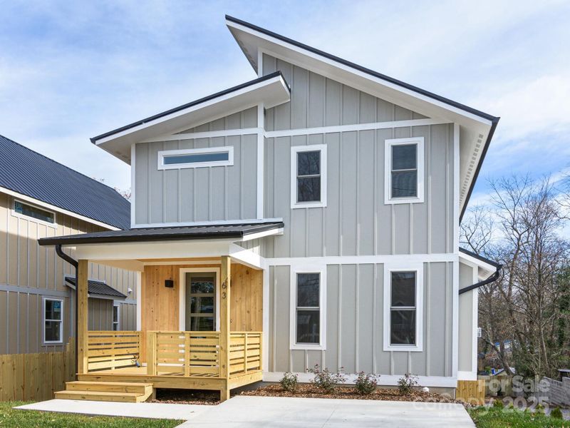 Front exterior of a new home in , Asheville, NC, highlighting curb appeal (Image 28).