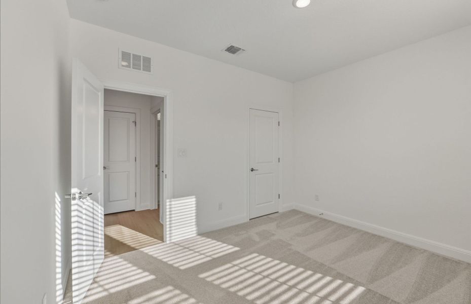 Spacious, unfurnished interior of a new home in Saddleback at Santa Rita Ranch, Liberty Hill (Image 22).