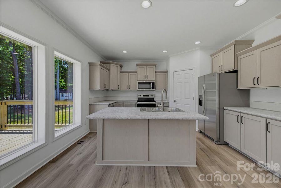 Furnished interior view inside a new home in , Newton (Image 6).