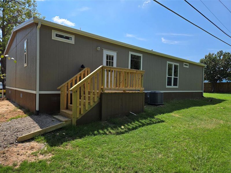 Exterior details and patio area of a home in , Pelican Bay (Image 17).
