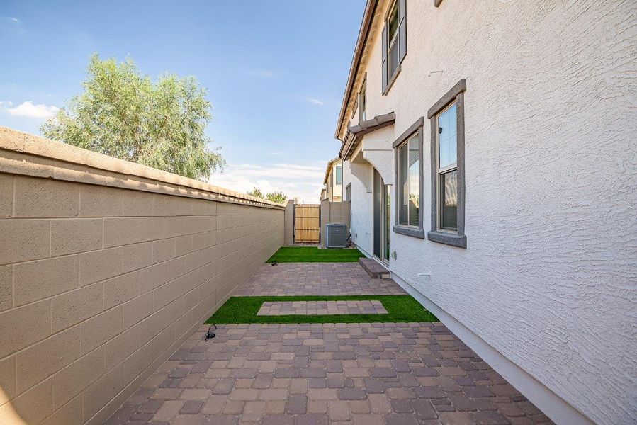 Front exterior of a new home in Ironwood Villages at North Creek, Queen Creek, AZ, highlighting curb appeal (Image 25).