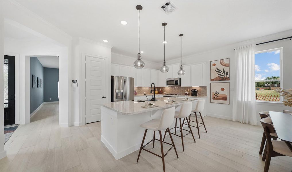 Lovely kitchen with island (*Photo not of actual home and used for illustration purposes only.)