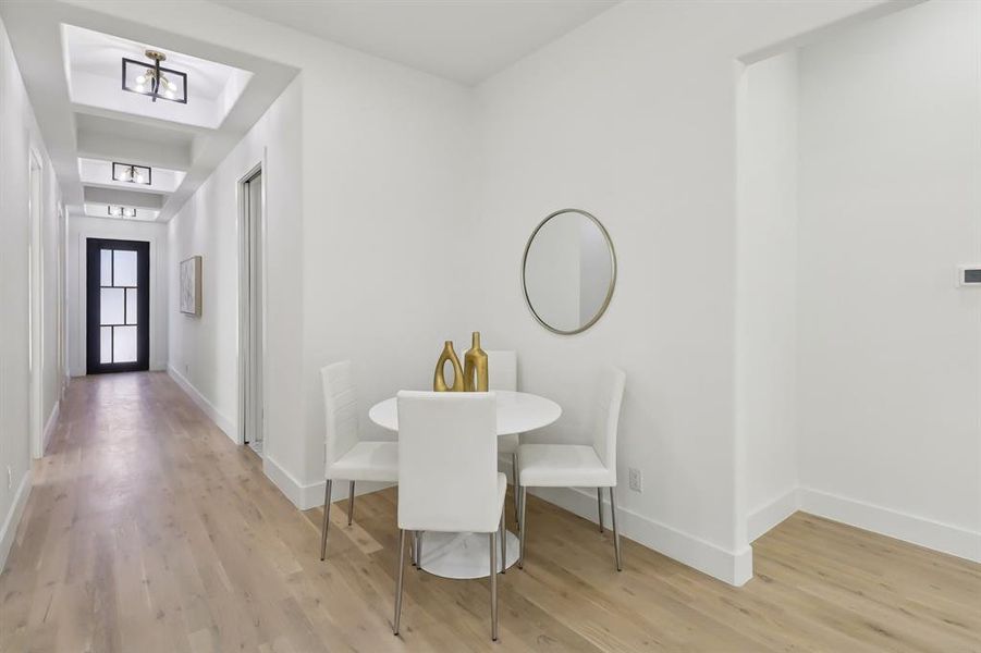 Dining space with wood finished floors