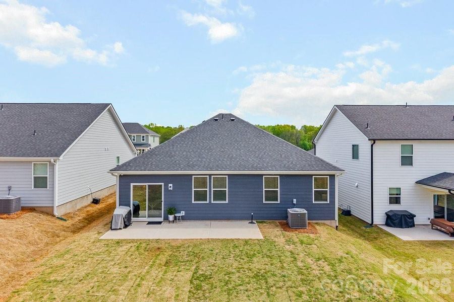 Exterior details and patio area of a home in Sheffield, Indian Trail (Image 26).