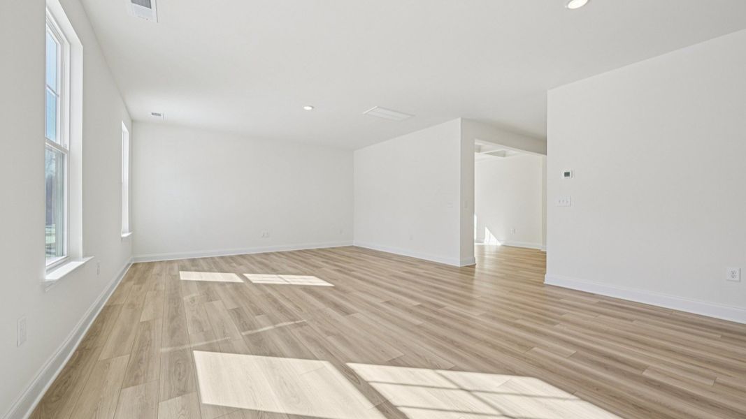 Representative furnished interior of a home built from the Wagener by DRB Homes in Station Pointe, Angier (Image 7).