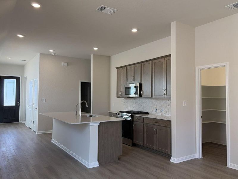 Furnished interior view inside a new home in La Cima, San Marcos (Image 5). Furnished interior view inside a new home in La Cima, San Marcos (Image 5).