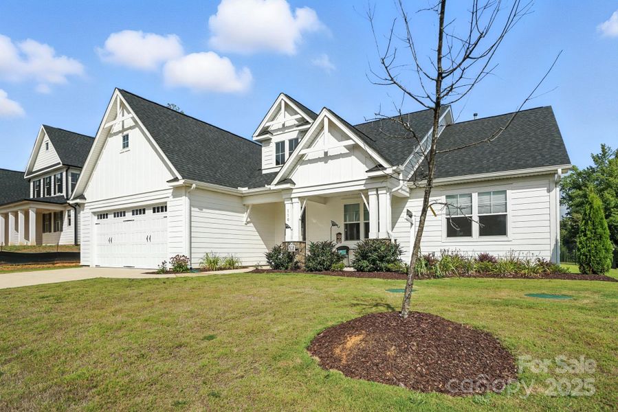 Front exterior of a new home in , Mooresville, NC, highlighting curb appeal (Image 2). Front exterior of a new home in , Mooresville, NC, highlighting curb appeal (Image 2).