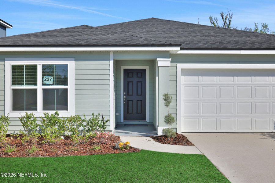 Exterior details and patio area of a home in Wilford Oaks, Orange Park (Image 3).