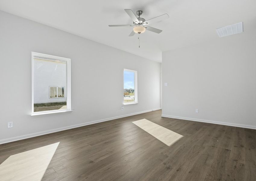 The family room has large windows that let in great, natural light.