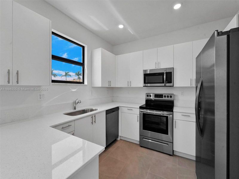 Furnished interior view inside a new home in , Homestead (Image 6). Furnished interior view inside a new home in , Homestead (Image 6).