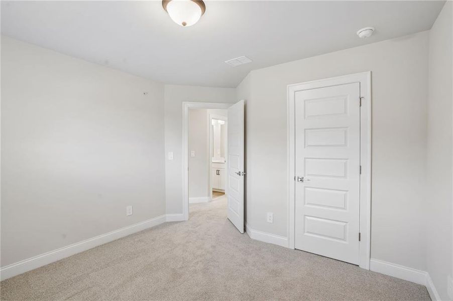 Spacious, unfurnished interior of a new home in Hemingway - Highland Series, Cumming (Image 36). Spacious, unfurnished interior of a new home in Hemingway - Highland Series, Cumming (Image 36).