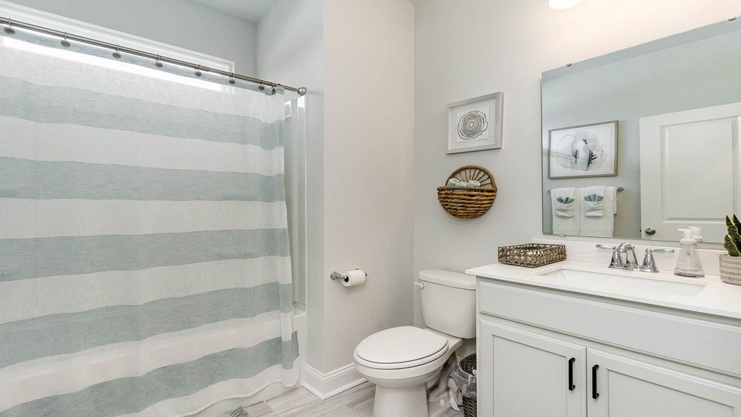 Representative furnished interior of a home built from the FORRESTER by D.R. Horton in The Bluffs at Mill Creek, Florence (Image 15).
