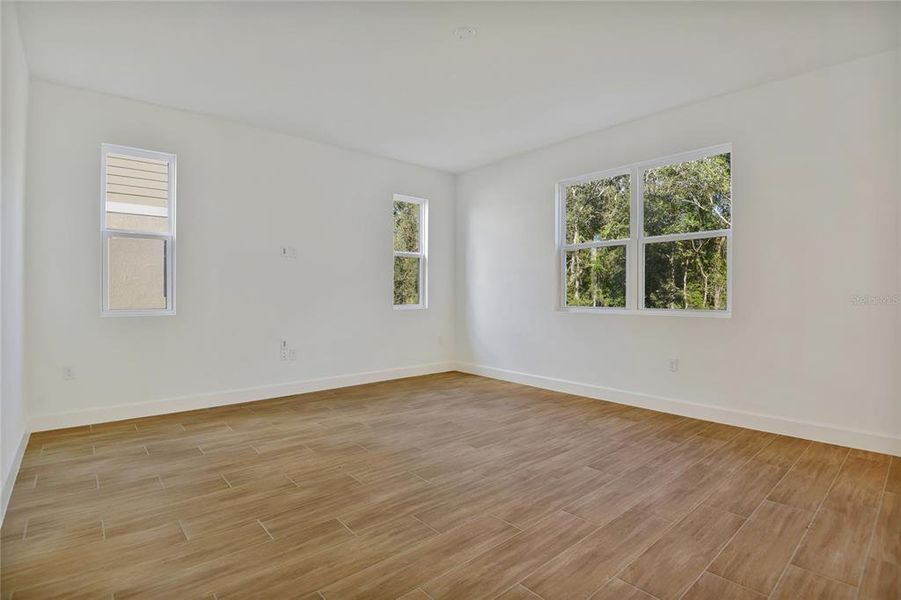 Spacious, unfurnished interior of a new home in Seasons at Wekiva Ridge, Mount Dora (Image 13).