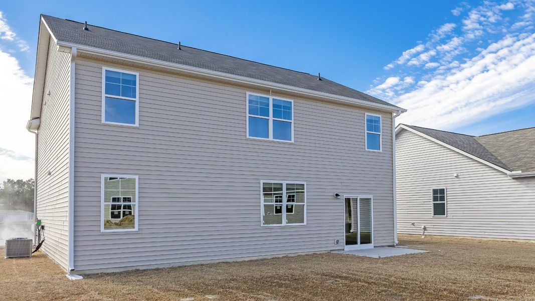 Representative exterior photo of a completed home built from the HAYDEN by D.R. Horton in Sidbury Station, Castle Hayne, NC (Image 21).