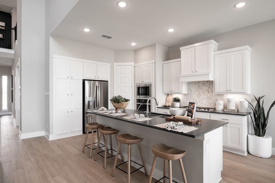 Representative furnished interior of a home built from the Verdin by Tri Pointe Homes in Pecan Ridge, Fulshear (Image 94).