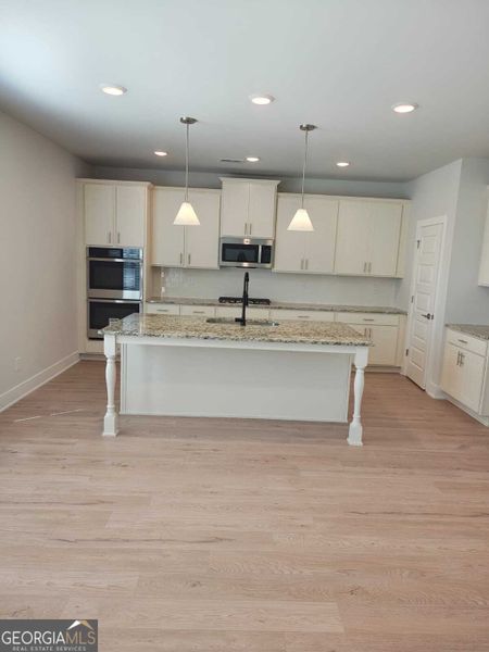 Furnished interior view inside a new home in The Fairways at Mirror Lake, Villa Rica (Image 3).