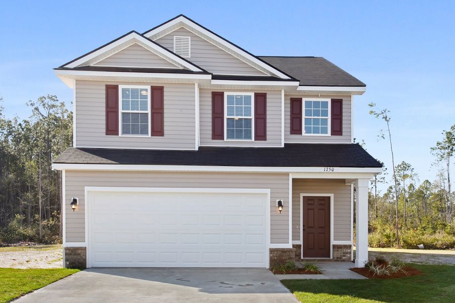 Representative exterior photo of a completed home built from the The Stacy by RTS Homes in Grand Reserve, Hinesville, GA (Image 20).