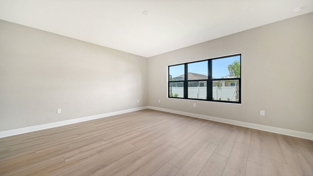 Spacious, unfurnished interior of a new home in Windward Real Estate and Homes for Sale in Sarasota, FL - Neal Communities, Lakewood Ranch (Image 36).