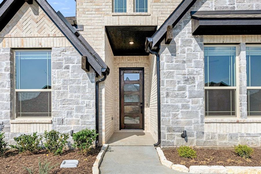 Exterior details and patio area of a home in Mockingbird Hills, Joshua (Image 3).