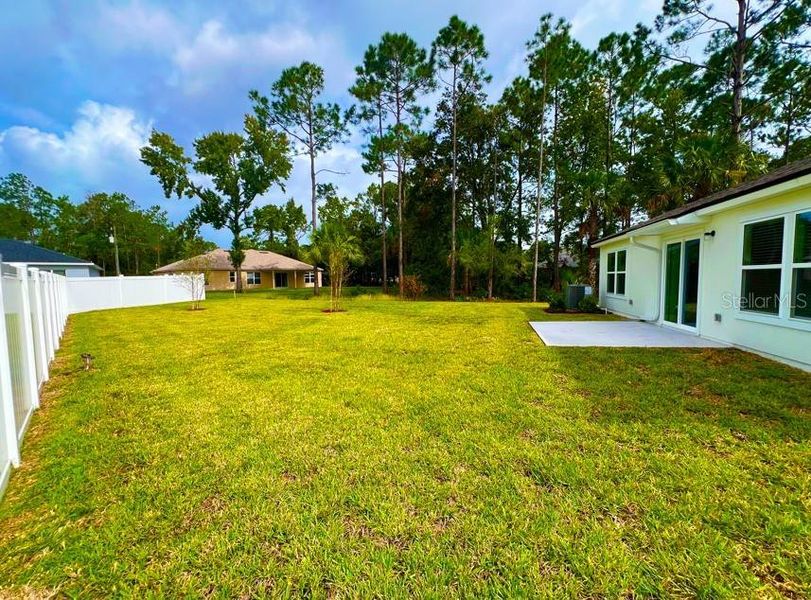Exterior details and patio area of a home in Palm Coast Homesites, Palm Coast (Image 3).