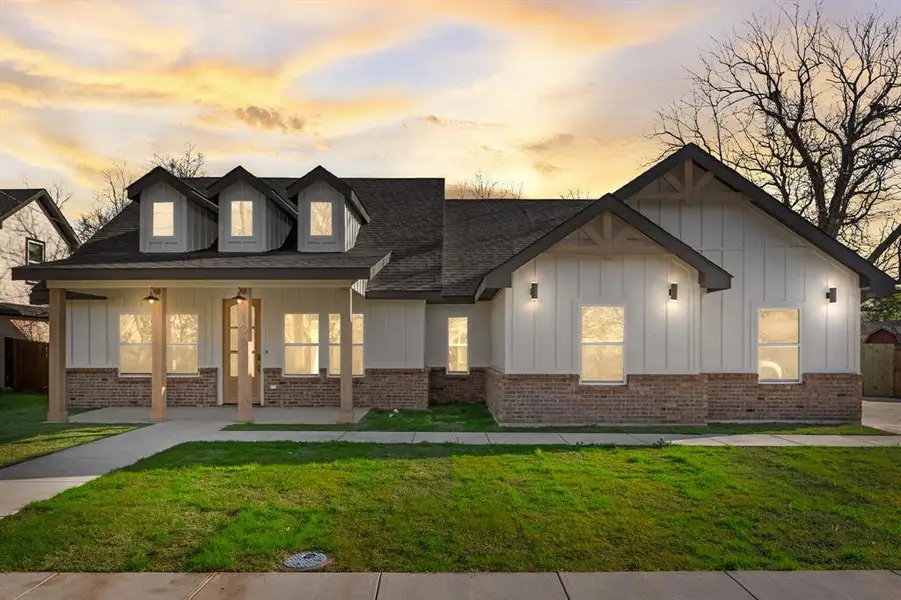 Front exterior of a new home in , Terrell, TX, highlighting curb appeal (Image 22).