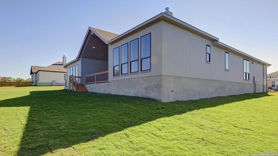Exterior details and patio area of a home in Megan's Landing 1/2 Acre, Castroville (Image 4). Exterior details and patio area of a home in Megan's Landing 1/2 Acre, Castroville (Image 4).