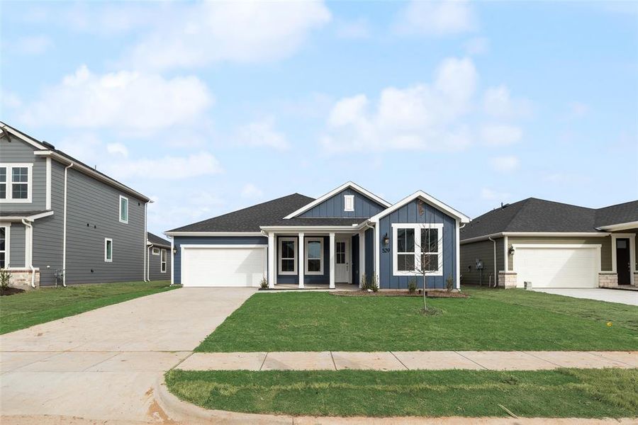 Front exterior of a new home in Creekside of Crowley, Crowley, TX, highlighting curb appeal (Image 20).