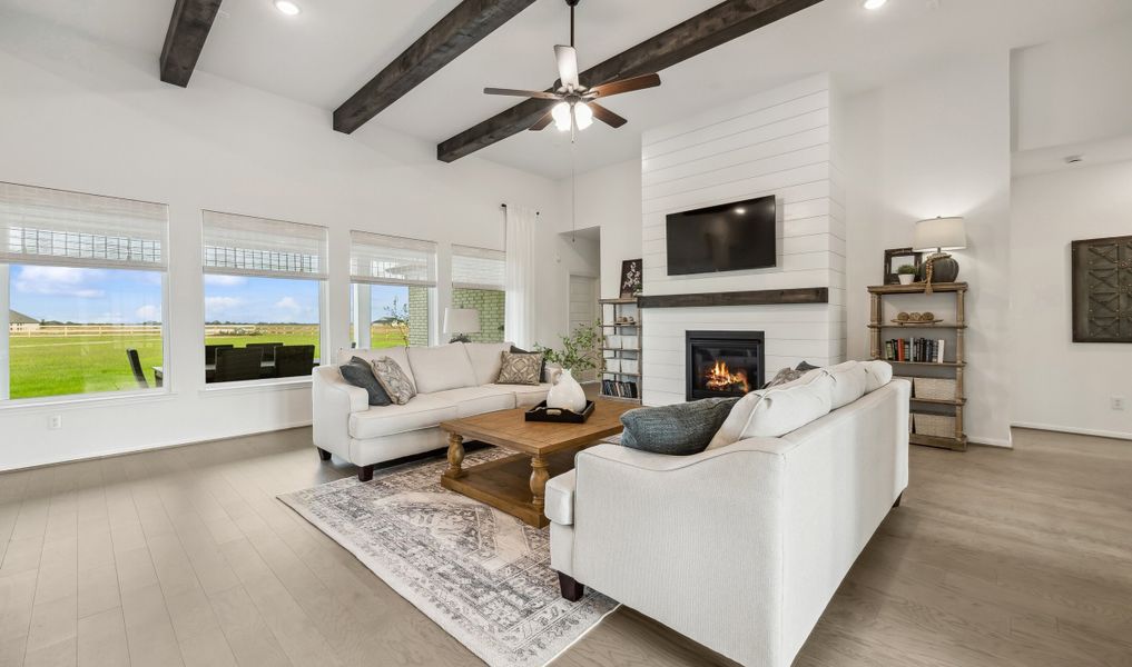 Gorgeous great room with stained ceiling beams