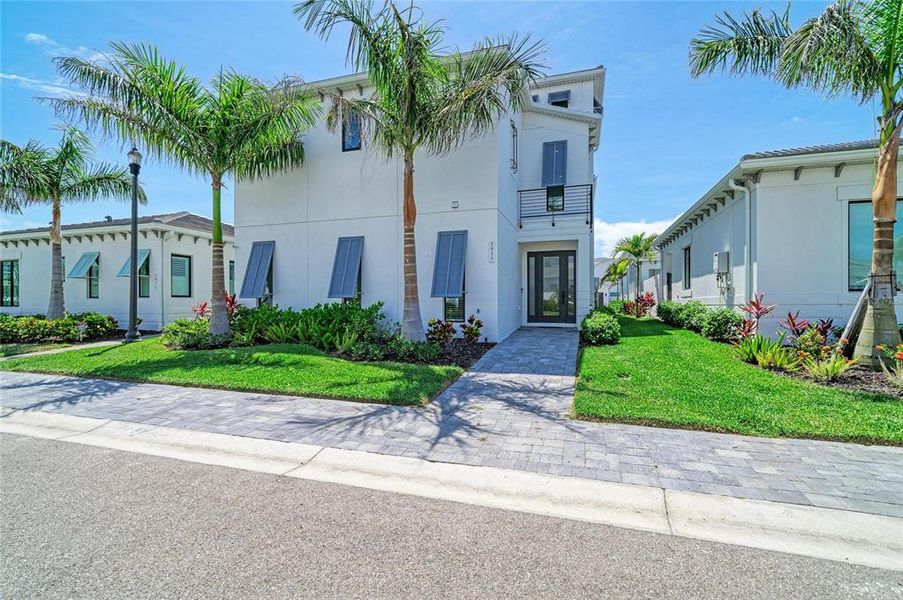 Front exterior of a new home in , Bradenton, FL, highlighting curb appeal (Image 1). Front exterior of a new home in , Bradenton, FL, highlighting curb appeal (Image 1).