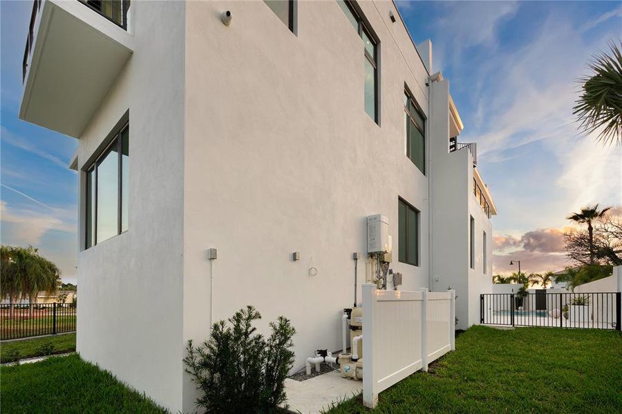 Exterior details and patio area of a home in , Longboat Key (Image 52).