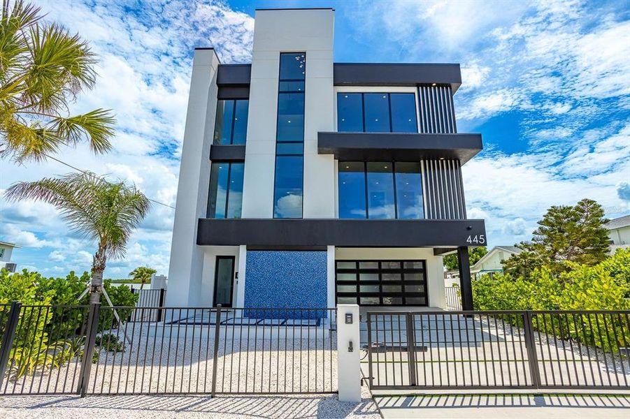 Front exterior of a new home in , Madeira Beach, FL, highlighting curb appeal (Image 24). Front exterior of a new home in , Madeira Beach, FL, highlighting curb appeal (Image 24).