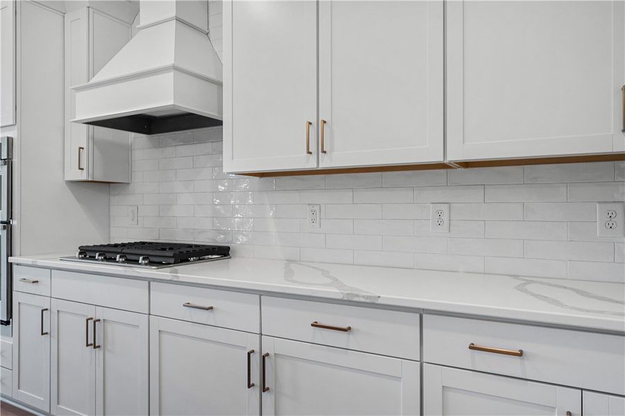 A refined kitchen showcasing sleek cabinetry and a A refined kitchen showcasing sleek cabinetry and a