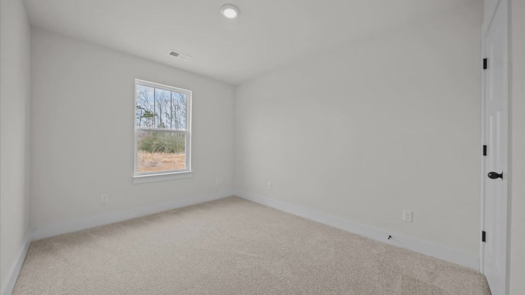 Representative unfurnished interior of a home built from the Beramont by DRB Homes in Pleasant Falls, Moore (Image 35).