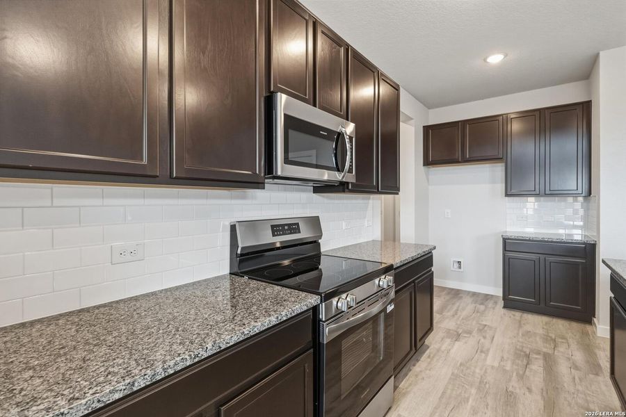 Furnished interior view inside a new home in Red Hawk Landing, San Antonio (Image 11).