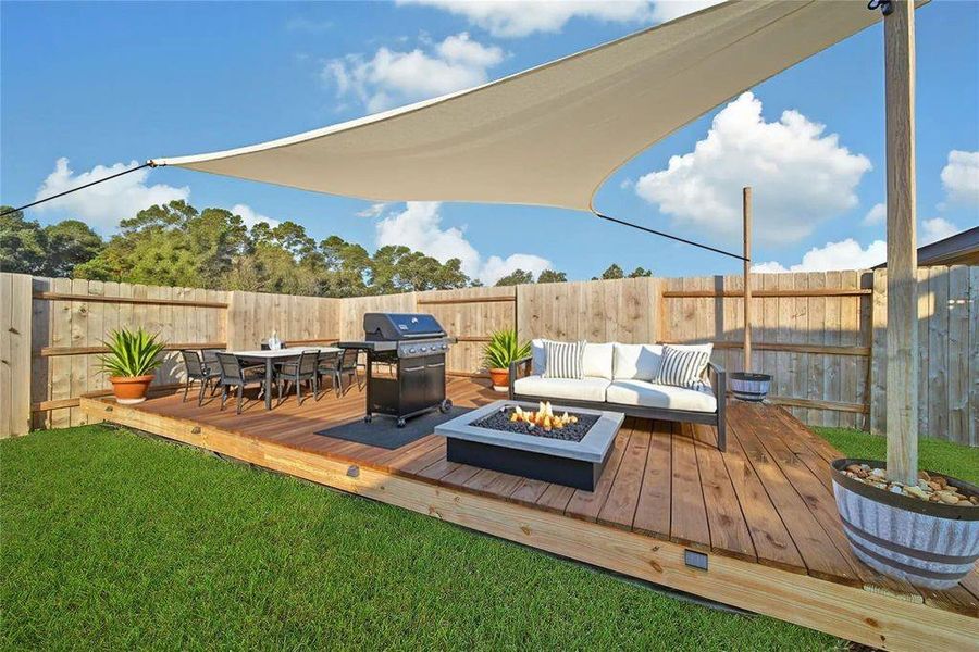 Exterior details and patio area of a home in Magnolia Place, Magnolia (Image 4).