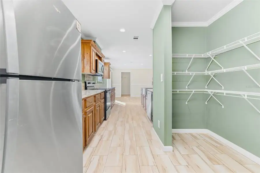 Furnished interior view inside a new home in , Live Oak (Image 4).