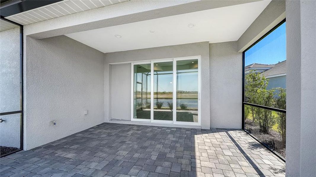 Exterior details and patio area of a home in Palm Grove, Lakewood Ranch (Image 3).