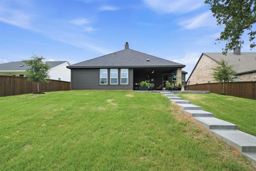Exterior details and patio area of a home in Covenant Springs, Springtown (Image 3).