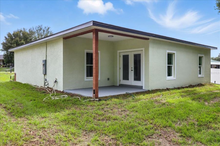 Exterior details and patio area of a home in , Citrus Springs (Image 24).
