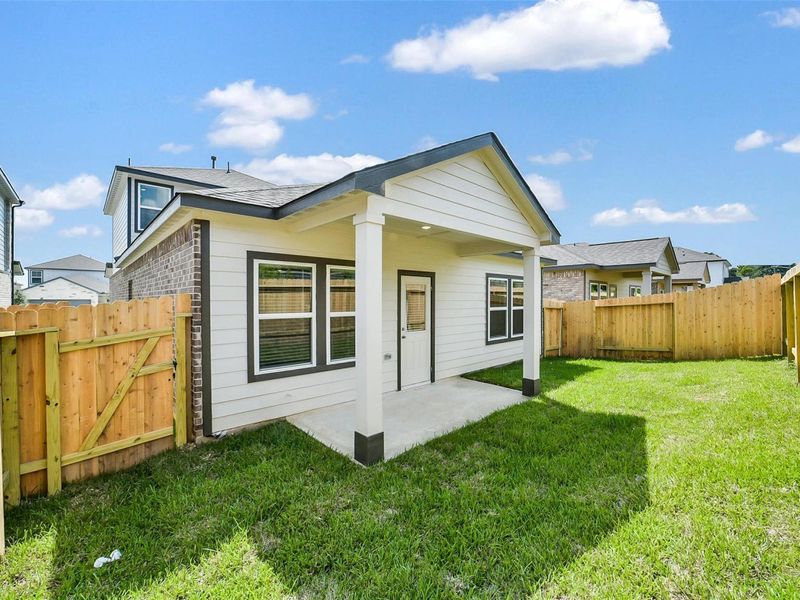 Exterior details and patio area of a home in Lakes at Black Oak, Magnolia (Image 23). Exterior details and patio area of a home in Lakes at Black Oak, Magnolia (Image 23).