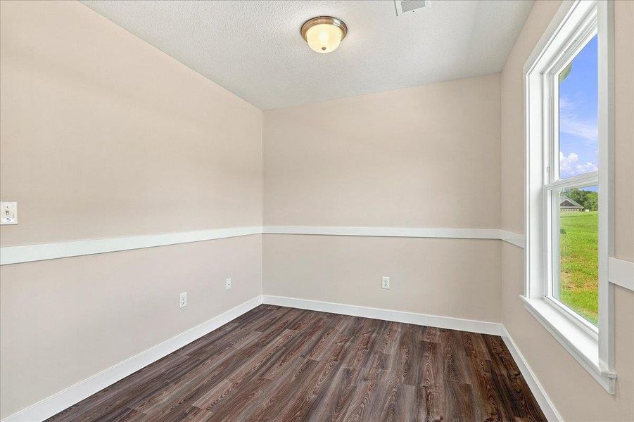 Spacious, unfurnished interior of a new home in Davis Heights, Inman (Image 19).
