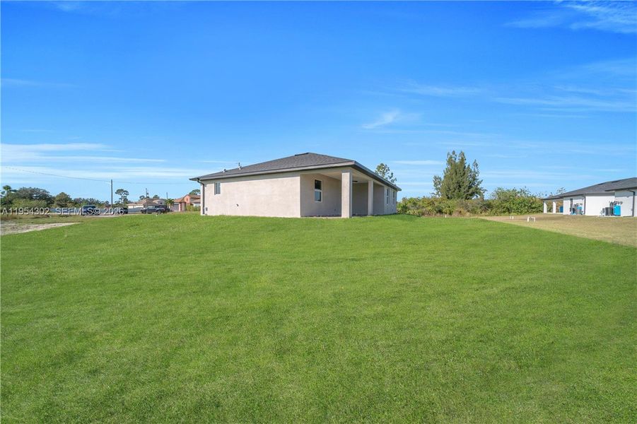 Exterior details and patio area of a home in , Lehigh Acres (Image 23).