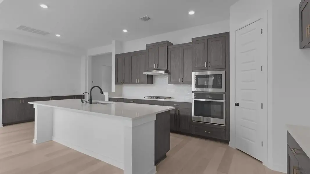 Furnished interior view inside a new home in Highland Village, Georgetown (Image 4).