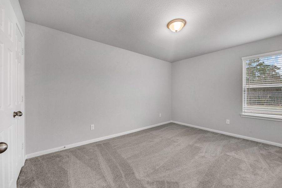 Representative unfurnished interior of a home built from the Floor Plan 1774 by Colina Homes in Rollingbrook Estates, Baytown (Image 23).