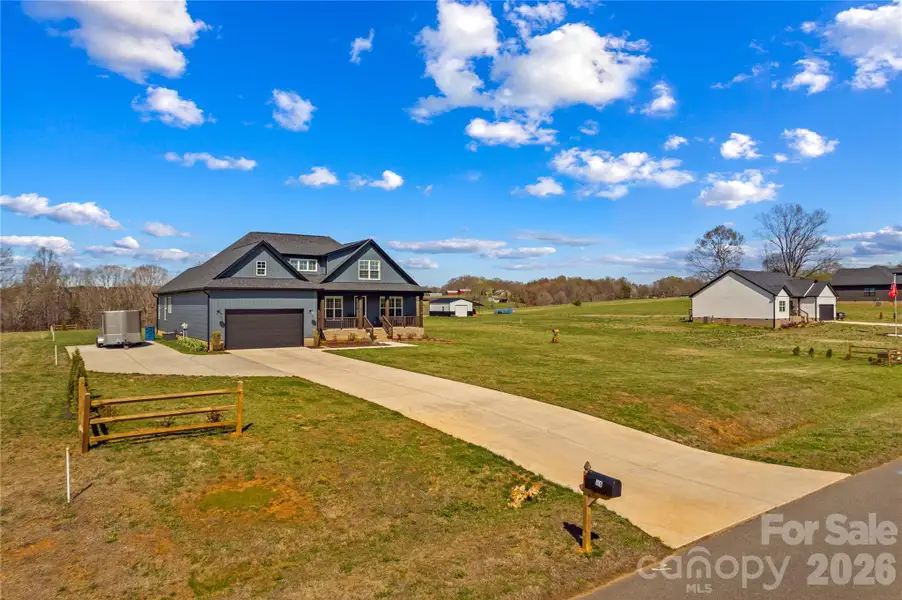 Front exterior of a new home in , Harmony, NC, highlighting curb appeal (Image 2). Front exterior of a new home in , Harmony, NC, highlighting curb appeal (Image 2).