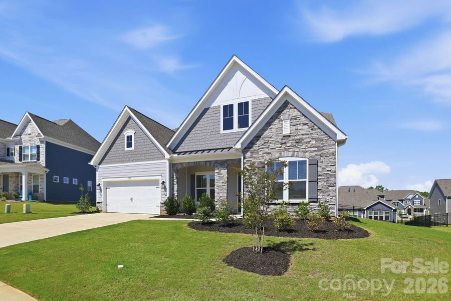 Front exterior of a new home in Estates at Sugar Creek, Indian Land, SC, highlighting curb appeal (Image 26).
